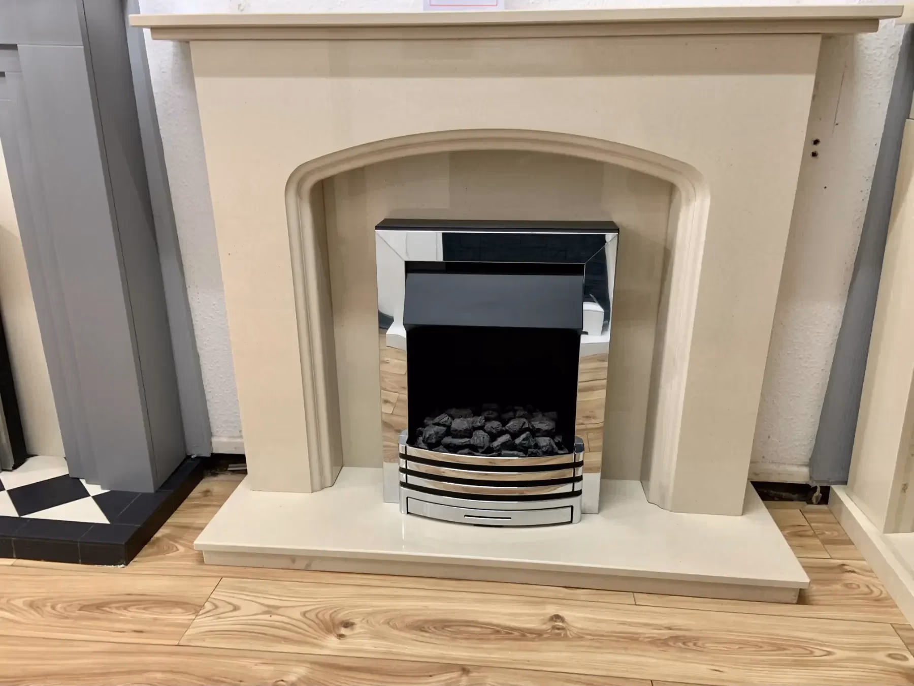 Bespoke Danbury Marble Fireplace shown in a room setting