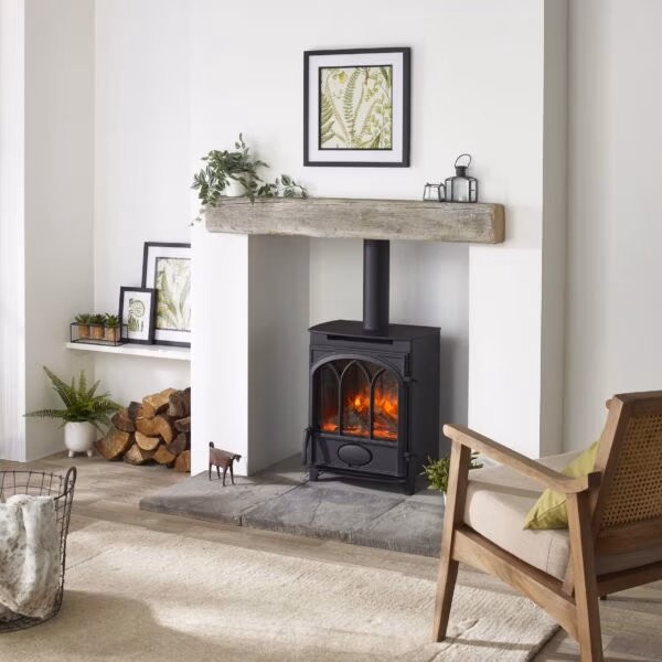 Charlton and Jenrick Alcaston electric stove, in an inglenook setting