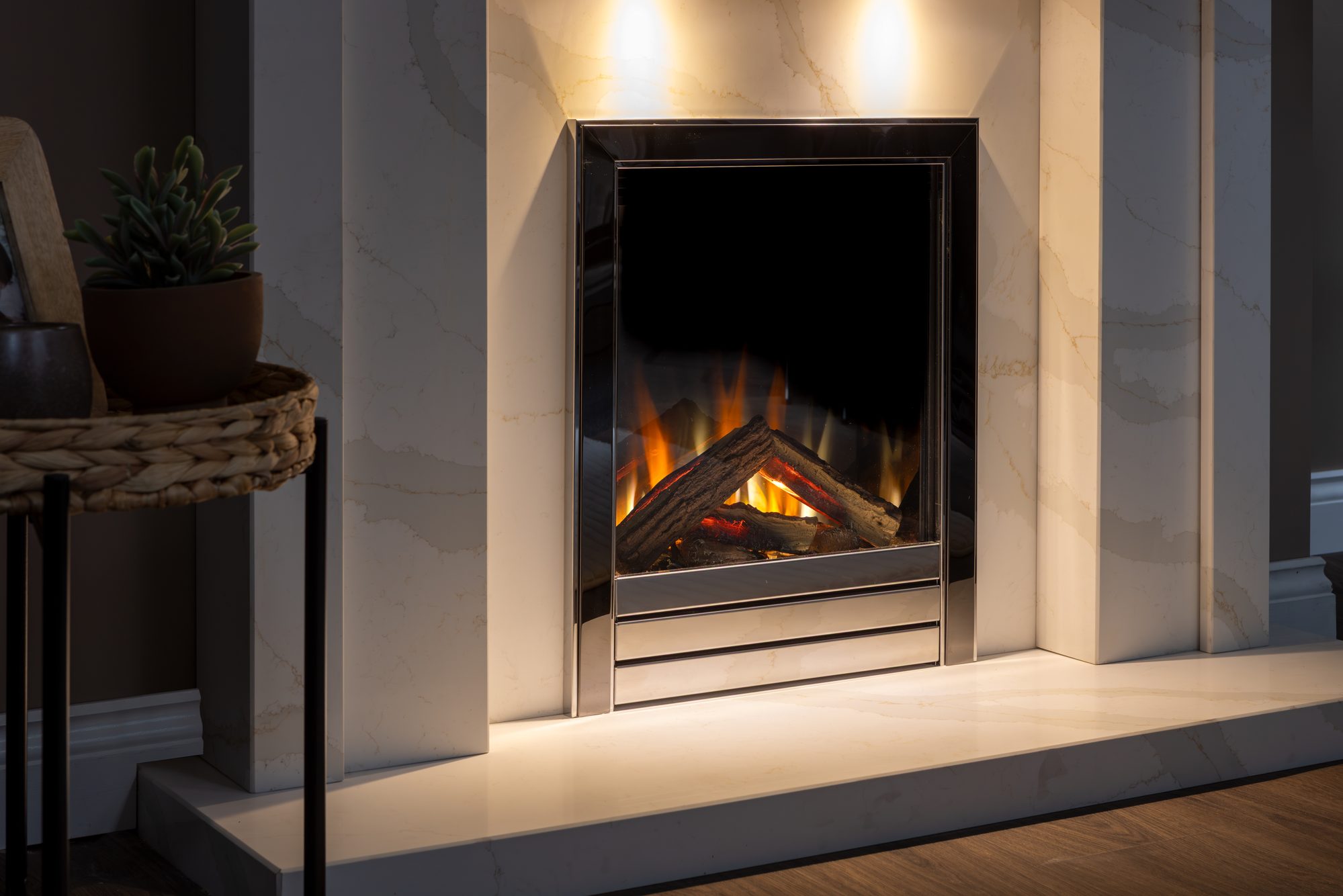 Charlton and Jenrick Panache 16 Deep inset electric fire in a marble surround, no chimney needed