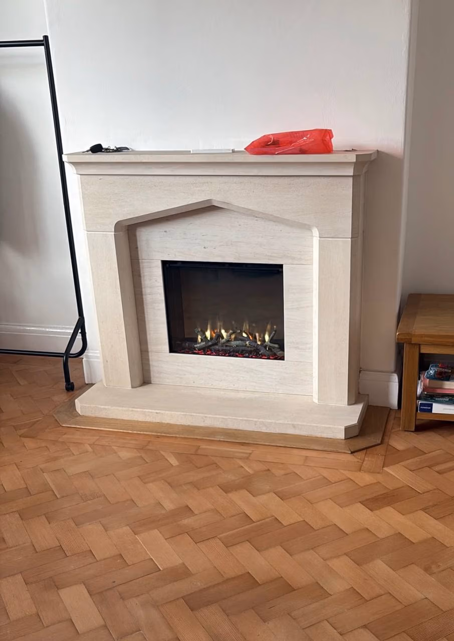 iRange 560 Slimline electric fire fitted into an existing fireplace in St Helens