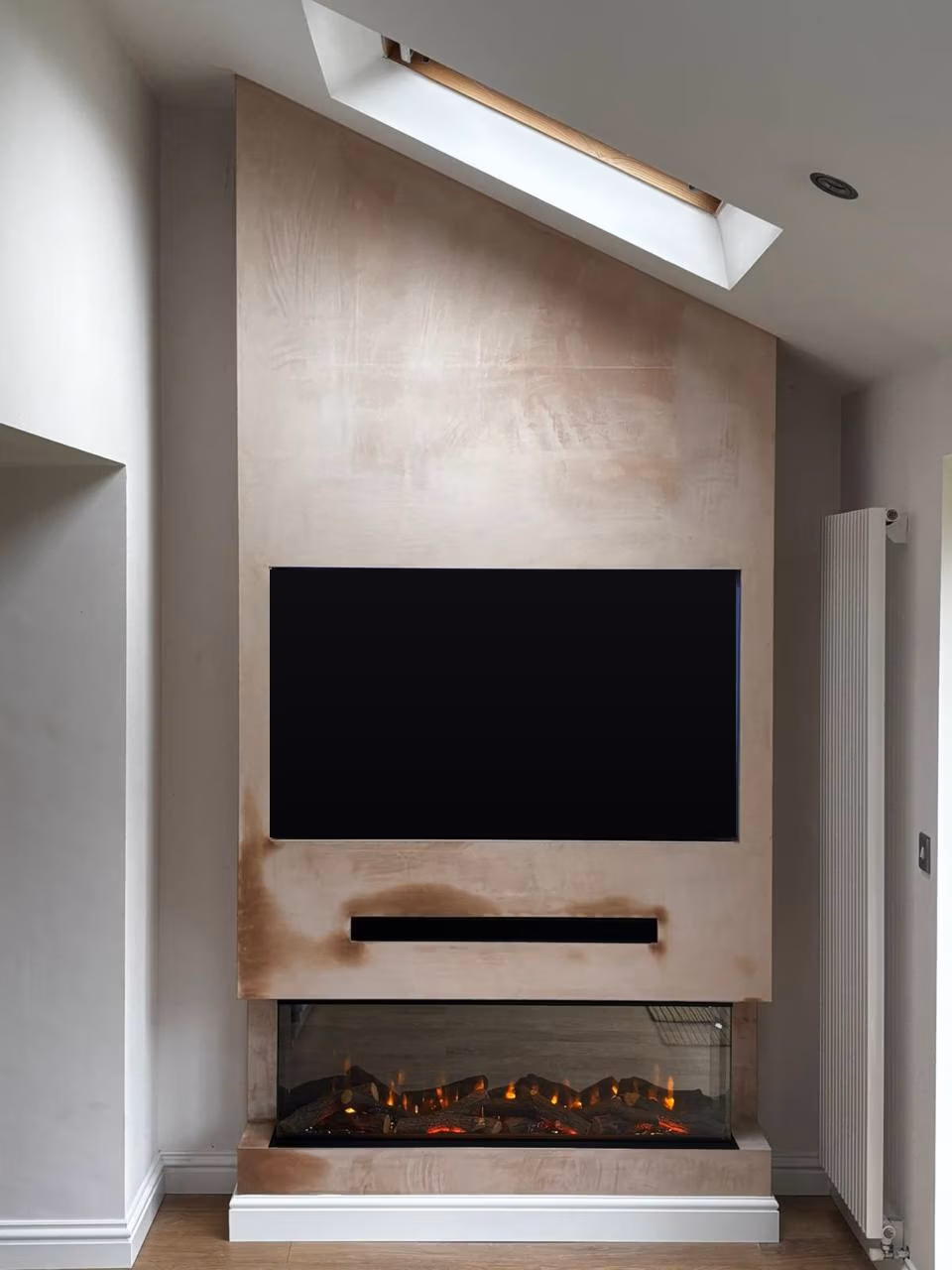 Warrington media wall with iRange Deep three sided electric fire